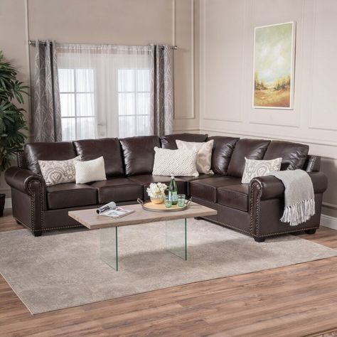 Hanging curtains around windows is a sure way to style up a room, bring in some color, and even make the space look a little bigger. But, it’s a big t... | Metallic Silver #Curtains #BrownSofa #BrownSofaCurtains #CurtainColors #Sofa #LivingRoom #DecoratedLife Relaxed Living Room Decor, Dark Brown Couch Living Room, Curtains To Go, Brown Leather Couch Living Room, Dark Brown Sofas, Dark Brown Furniture, Color Curtains, Brown Furniture Living Room, Leather Sectionals