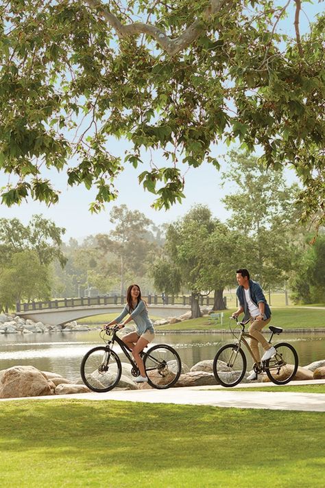 Surrounded by rows of shaded trees, William Mason Regional Park offers the perfect place to take a stroll or bike ride on a warm summer day. #VillagesOfIrvine #Hiking #Biking People At The Park, People In Park, Park Activities, Park Date, Park Life, Resort Architecture, Hills Resort, Outdoor Biking, Ride Bicycle