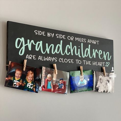 Celebrate the special bond with your grandchildren using our 'Side by Side or Miles Apart, Grandchildren Are Always Close to the Heart' plank design. Perfect for hanging cherished photos, this heartfelt piece adds a warm and loving touch to any space. Whether near or far, this sign beautifully captures the connection that keeps family close, no matter the distance. Cricut Projects For Gamers, Quick And Easy Cricut Projects To Sell, Cheap Cricut Gifts, Homemade Cricut Gifts, Grandparent Cricut Gifts, Crafts For Craft Fairs Make And Sell, Cricut Projects For Grandparents, Small Cricut Projects To Sell, Cricut Grandma Gifts