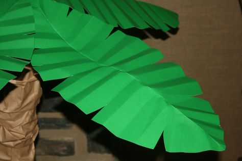 paper palm tree | Paper Petals Elegant, Whimsical, Beautiful… Rainforest Classroom, Vbs Jungle, Paper Palm Tree, Theme Tree, Paper Trees, Jungle Thema, Fiesta Tropical, Jungle Baby Shower Theme, Palm Tree Leaves