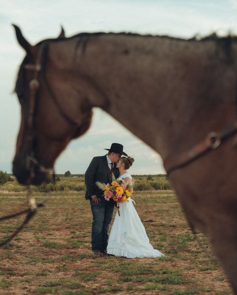 Dusti + Riley I had the honor of taking this beautiful couples photos and I am OBSESSED. This was my first time taking photos with a horse but it definitely wont be the last! 🏷️ #utahphotographers #southernutahphotographer #southernutahcouplesphotographer Southern Utah Photographer , Western couples photographer Wedding With Horses Photo Shoot, Bride Riding Horse, Wedding Horse Photos, Western Bride Photoshoot, Country Wedding Horses, Horseback Wedding Photos, Bull Riding Photography, Bride Horse Photography, Equestrian Engagement Photos