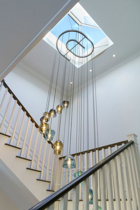 Chandelier From Skylight, Stairs Chandelier, Modern Skylights, Flat Roof Skylights, Stairwell Chandelier, Spiral Chandelier, Chandelier Designs, Skylight Design, Stairwell Lighting