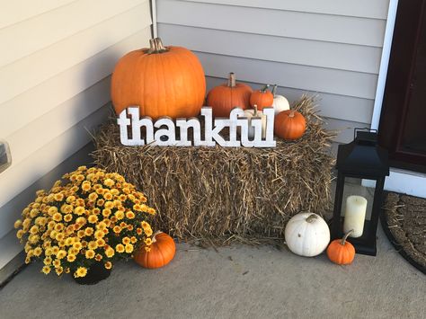 Fall Porch Decor! Hay bale $6 from Lowe's, Lantern from TJ Maxx, "Thankful" sign from Hobby Lobby, Mum $3 from Walmart, Pumpkins from local pumpkin patch. Straw Bale Fall Decor Porch, Straw Bale Porch Decor, Haybale Front Porch Decor, Hay Bale Halloween Decorating Ideas, Fall Porch Decor Hay Bales And Pumpkins, Bails Of Hay Decor Fall, Hay Porch Decor, Fall Front Porch Hay Bales, Fall Front Porch Decor With Hay Bales