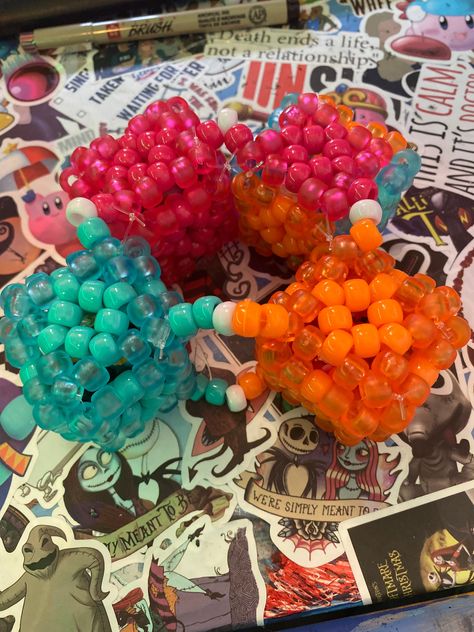 A Kandi shaker cuff. It is four 3D shaker cubes tied together into a bracelet! Kandi Shaker Cube, Kandi Square, Kandi Tie, Kandi Charms, 3d Kandi Cuff, 3d Kandi, Kandi Inspo, Diy Kandi Bracelets, Therian Stuff