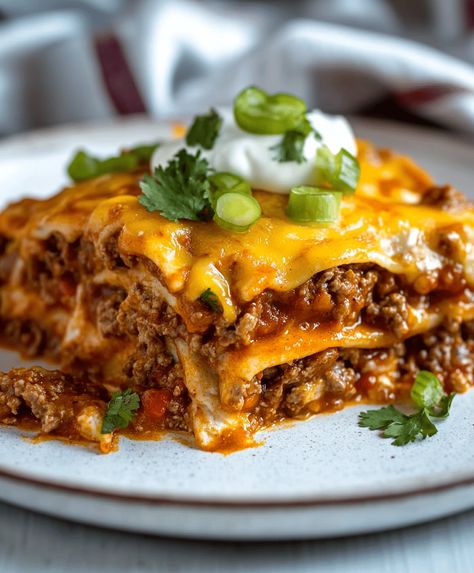 Beef Enchilada Casserole Recipe - cookingwithtina.com Stacked Enchiladas Beef, Enchilada Dinner, Enchiladas Beef, Stacked Enchiladas, Beef Enchilada Casserole, Meat Casseroles, Casserole Beef, Mexican Food Dishes, Beef Enchilada