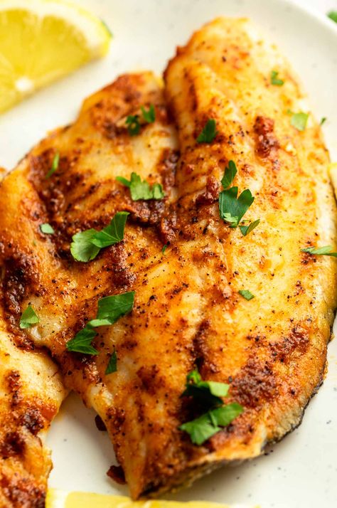 Close up shot of tilapia in air fryer. Tilapia In Air Fryer, Panko Tilapia, Tilapia Air Fryer, Air Fryer Tilapia, Dairy Free Mashed Potatoes, Frozen Tilapia, Fried Tilapia, 10 Minute Meals, Leafy Salad