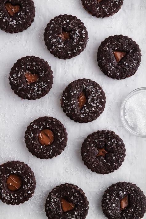 These Chocolate-Nutella Linzer Cookies feature dark chocolate roll-out cookies sandwiched with creamy chocolate-hazelnut spread for a delightfully delicious treat that's perfect for Christmas or any time of year! #girlversusdough #chocolatecookies #linzercookies #Nutellacookies Linzer Cookie, Sandwich Cookies Filling, Linzer Cookies Recipe, Linzer Cookies, Chocolate Roll, Nutella Cookies, Chocolate Hazelnut Spread, Recipe Girl, Chocolate Sandwich