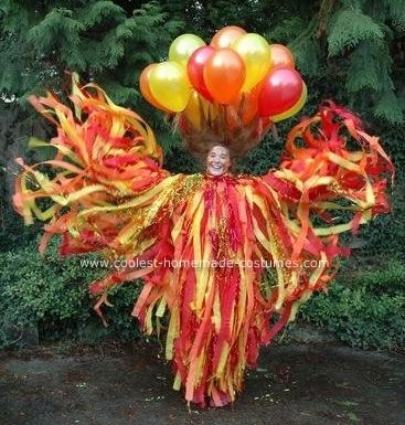 Homemade Fire Costume: Hello, my name is Laura, I’m a senior in high school, and I make crazy costumes for my school’s spirit week and for Halloween. This was for Caveman Day Senior In High School, Fire Witch, Fire Costume, Gryffindor Pride, Pentecost Sunday, Fire Fairy, Crazy Costumes, Mardi Gras Outfits, Festival Ideas