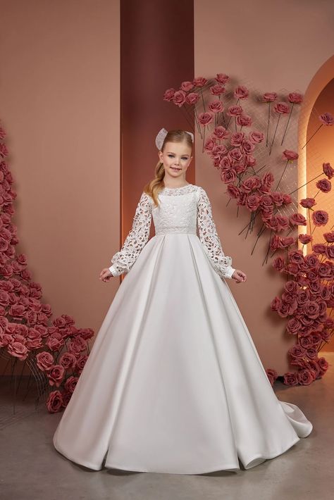 Make your little one's special day even more magical with our Enchanting Elegance Communion Dress. This exquisite dress is designed to create a lasting impression, capturing hearts with its timeless charm and attention to detail. Crafted from the finest materials, our Communion Dress features a delicate lace bodice that adds a touch of grace and sophistication. First Communion Dresses Catholic, Comunion Dress, Dress With Bishop Sleeves, White Communion Dress, Beaded Flower Girl Dress, Beauty Pageant Dresses, Holy Communion Dresses, First Communion Dress, Dress For Wedding