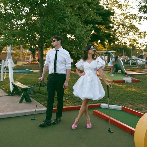 springfield’s nostalgic fun acre, victoria wearing her momma’s repurposed wedding dress, hot pink shoes and golf balls. 🩷 victoria & aidan ended their engagement session on the putt putt course, where they had their first date 🥹 Mini Golf Engagement Photos, Golf Course Engagement Photoshoot, Golf Course Couple Photoshoot, Sporty Engagement Photos, Mini Golf Photoshoot, Golf Course Engagement Photos, Golf Engagement Photos, Repurposed Wedding Dress, Putt Putt Course