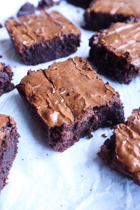 brownies on parchment with glossy and flaky topping Brownies With Sweetened Condensed Milk, Condensed Milk Brownies, Brownie Recipe With Cocoa, Condensed Milk Desserts, Cocoa Powder Brownies, Cocoa Powder Recipes, Brownie Desserts, Brownie Recipe, Semi Sweet Chocolate Chips