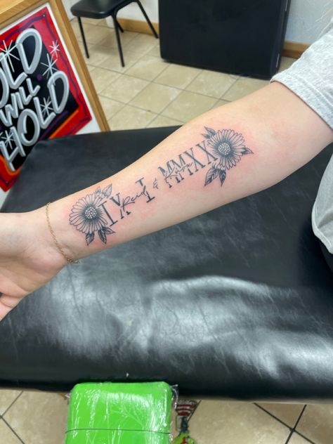 Twin mom tattoo Tattoo Ideas For Twins Mom, Mom Of Twins Tattoo Ideas, Tattoo For Twins Mom, Twin Mom Tattoo, Roman Numeral Tattoo With Flowers, Last Name Tattoos, Twin Tattoos, Kid Name Tattoo, October Birth Flowers