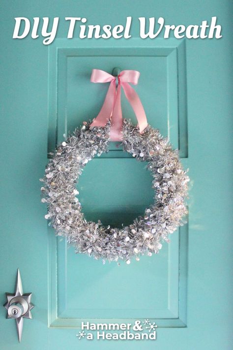 Silver tinsel Christmas wreath with pink ribbon on turquoise door for a mid-century Christmas Tinsel Ideas Decoration, Diy Mini Christmas Wreath, Diy Tinsel, Silver Tinsel Christmas Tree, Mini Christmas Wreath, 30 Minute Crafts, Silver Tinsel Tree, Tinsel Wreath, Pink Christmas Wreath