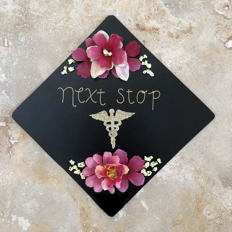 #grad #graduationcap #diy #college #graduation #medicalschool #medicalsymbol #med #doctor #dr #medschool #md Pro tip*** use the back of a flimsy binder as a background (cut the shape of the cap) and Velcro it to your cap so you don’t ruin the cap itself! Graduation Cap Designs Medicine, Doctor Grad Cap Ideas, Future Doctor Grad Cap, Premed Graduation Cap, Biology Graduation Cap, Physician Assistant Graduation, Graduation Diy Decorations, Med Doctor, Grad Cap Decoration