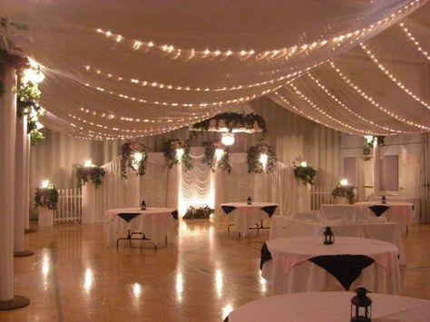 Wedding season is in full swing! And for LDS couples, one great way to keep wedding costs down is by having a reception in the church's cultural hall. Skeptical? Check out these amazing transformations! Lds Weddings Reception, Reception Ceiling, Wedding Ceiling Decorations, Wedding Ceiling, Mississippi Wedding, Ceiling Draping, Wedding Hall Decorations, Lds Wedding, Hall Decor