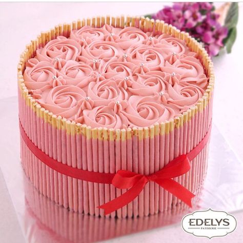 Pink rosette strawberry pocky cake by @edelyspatisserie. Location: Jakarta Pocky Cake, Charlotte Cake, Cake Rack, Icing Recipe, Diy Cake, Cooking Recipes Desserts, Wedding Desserts, Sweet Cakes, Buttercream Cake