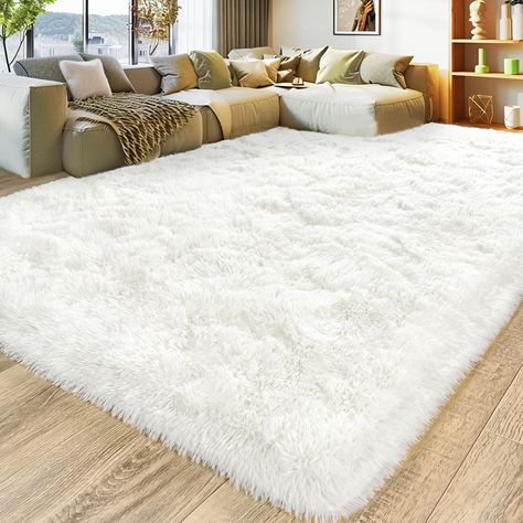 PRICES MAY VARY. Super Fluffy Living Room Rug: The 8x10 shag living room rug is made of high-density microfiber, with 1.7 inches pile, which will not shed after long-term use. Stepping onto the plush rug, indulge in pure comfort—a subtle sensation that brings delight with every step. Embrace the soft joy cherished by your entire family, including children and pets Upgrade Non Slip Bottom Rug: The plush fuzzy bedroom rug has thousands of non slip points at the bottom, ensuring that the carpet is Fluffy White Rug Bedroom, White Rustic Rug, White Rugs Living Room, White Rug Bedroom Aesthetic, Fuzzy Rug Bedroom, Cozy Rugs For Bedroom, Cozy Bedroom Rugs, White Home Decor Living Rooms, Fluffy Carpet