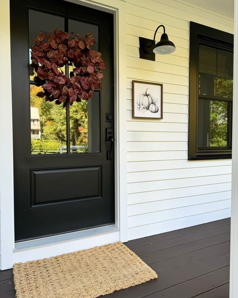 Autumn views 🍂🍁🤎 . . . #home #homedecor #homesweethome #homedesign #falldecor #fallstyle #fallvibes #fallcolors #fallseason #homeinspo #homedecoration #farmhousestyle #decoronadime #affordablefinds #diy #doityourself #diyprojects Farmhouse Front Door Black, Front Door Small Porch, Black Farmhouse Front Door, Black Door Exterior, Front Door Black, Front Door With Sidelights, Upstairs Ideas, Exterior House Doors, Wood Front Door