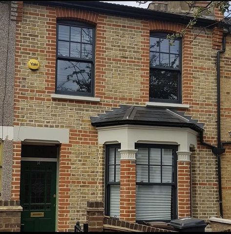 Black Sash Windows Exterior, 1920s House Exterior Uk, Black Sash Windows, Black Window Frames Exterior Houses, Victorian Terrace Exterior, Masonry Paint Colours, Clean Outdoor Windows, Grey Window Frames, Farrow And Ball Living Room