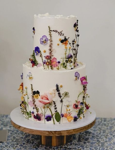 Wedding Cakes With Wild Flowers, Meadow Wedding Cake, Wild Flower Theme Wedding, Wildflower Bridal Shower Cake, Wild Flowers Wedding Cake, Wildflower Wedding Theme Cake, Wild Flower Engagement Party, Whimsical Garden Wedding Cake, Wedding Cakes With Real Flowers