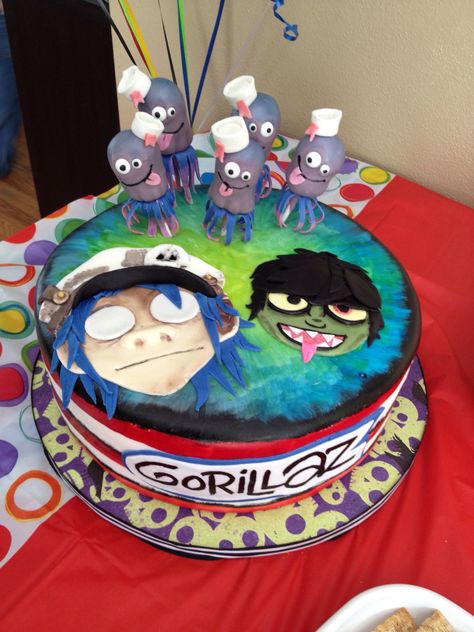 Gorillaz birthday cake with superfun jellyfish cakepops www.shophappybaker.com Gorillaz Birthday Party, Gorillaz Birthday Cake, Gorillaz 2 D, Spidey Birthday, Noodle Gorillaz, The Gorillaz, Anime Canvas Painting, Gorillaz Art, Carnival Themes