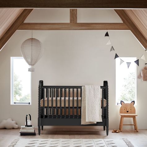 A bestseller for a reason, our Jenny Lind Black Crib is a timeless piece for the nursery. The iconic collection, with its intricate wood turnings, has been made in the same location with the same classic design for more than 20 years-but its modern sensibility means it hasn't aged a day. Each spindle is made from a single piece of wood, then hand-sanded to capture every gorgeous detail. The Jenny Lind crib seamlessly grows with your little one thanks to the easy-to-assemble Jenny Lind Toddler Be Black And Cognac Nursery, Black Iron Crib Nursery, Neutral Nursery With Black Crib, Black Jenny Lind Crib Nursery, Crib Decor, Nursery With Black Crib, Jenny Lind Black Crib, Black Crib Nursery Ideas, Jenny Lind Natural Crib