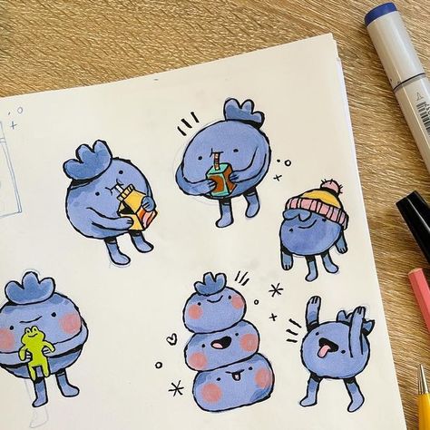 Sara McCracken on Instagram: "Little blue Berry sketches for a new sticker sheet 🫐✨ Now I just have to pick the ones that will end up in the sheet and it’s too hard 😭💙" Blueberry Doodle Drawing, Blueberry Doodle, Blue Berries Drawing, Blueberry Cute Cartoon, Blueberry Cartoon, Cartoon Blueberry, Blueberry Drawing, Blueberry Plant Illustration, Blue Berry