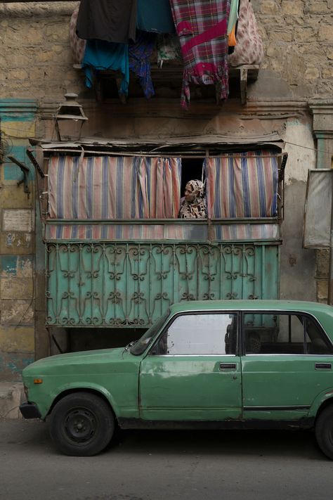 Woman peeks out of her home in Islamic Cairo, Egypt Egypt Streets, Arabic Cafe, Cairo Streets, Aesthetic Egypt, Egyptian Streets, Everyday Life Photography, Cairo City, Life In Egypt, Old Egypt