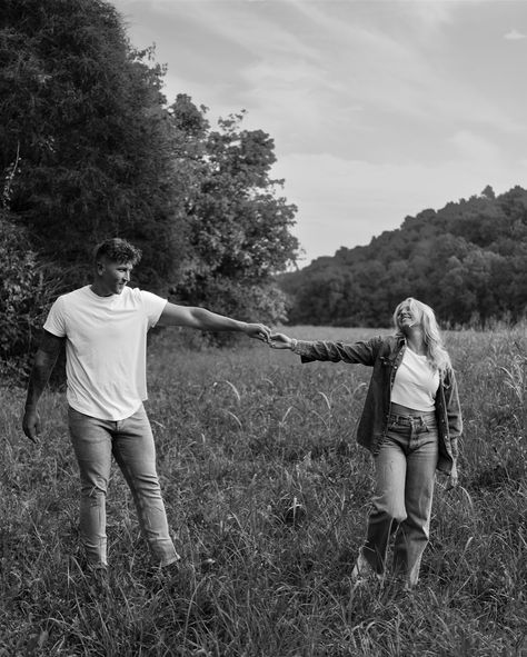 The cutest couples session on the farm!! These two got married almost a year ago and I was so stoked to get them out to the farm to take pictures 🥰 We had huge green fields to run in, yellow flowers still blooming, and a little creek to skip rocks in. It was such a fun evening! Fall Field Couples Pictures, Couple Fall Session, Fun Fall Couple Photoshoot, Pasture Couple Pictures, Couple Pose Pictures, Cute Fall Poses For Couples, Fun Couples Photoshoot Poses, Couple Poses In Field, Cute Pictures To Take By Yourself