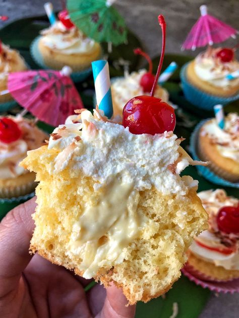 Dorothy Dean presents: You’ll like these piña colada cupcakes – and it won’t require getting caught in the rain | The Spokesman-Review Pina Colada Cupcakes Non Alcoholic, Pina Colada Cupcakes With Box Cake, Pina Colada Cupcakes With Rum, Pins Colada Cupcakes, Pina Colada Cupcake Recipe, Hawaiian Cupcakes Ideas, Summer Flavor Cupcakes, Margaritaville Cupcakes, Luau Cupcake Ideas