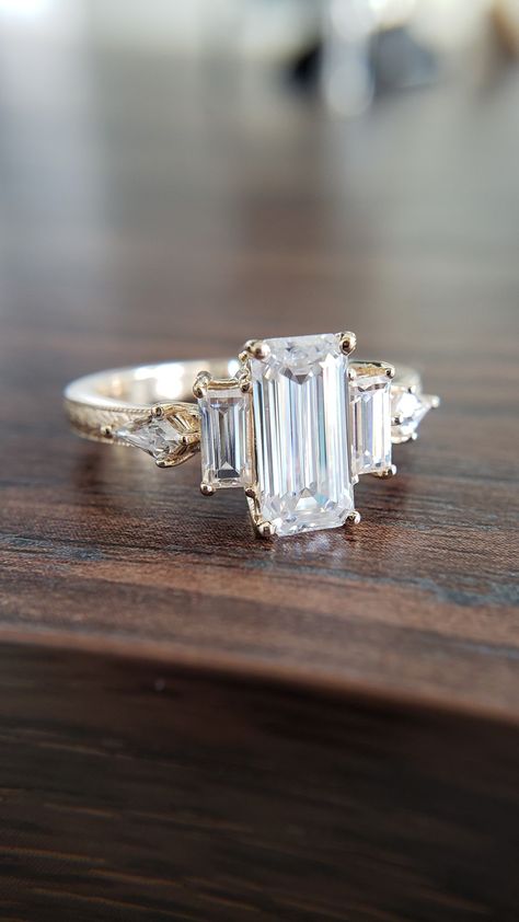 Antique Engagement Rings Emerald Cut, Art Deco Wedding Ring Vintage, Silver Vintage Wedding Rings, Art Deco Style Engagement Ring, Unique Emerald Cut Ring, Non Traditional Wedding Rings Engagement, Vintage Emerald Cut Rings With Diamond Accents, Vintage Emerald Cut Gold Diamond Ring, Collectible Vintage Emerald Cut Diamond Ring