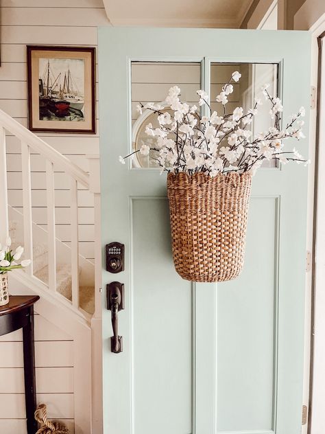 Wall By Front Door Decor, Diy Door Basket, Hanging Flower Baskets Front Door, Floral Baskets For Front Door, Hanging Basket On Front Door, Spring Small Front Porch Decor, Front Door Flower Basket, Wall Next To Front Door Decor Inside, Basket On Front Door