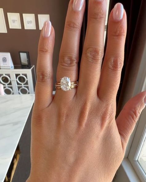 Adiamor on Instagram: "Tag your partner to drop a hint if you would love this perfect Oval Diamond Engagement Ring set😍  ✨this ring stacks well with a spacer band ✨oval diamonds look amazing on everyone! ✨2.50 carats is a great choice for subtle sparkle  ✨this ring is extremely customizable   Ring details: 2.50 oval Lab grown F VS1 10.84 × 7.62 x 4.81 mm 1.42. LWR R3128 basket solitaire 18 k yellow gold Size 5 Custom platinum basket  Custom hidden Halo Shown with R3016 1.7mm plain RF3001 open spacer band Custom 2mm width" Large Oval Engagement Ring Gold Band, Oval Plain Band Engagement Ring, Plain Gold Oval Engagement Ring, Gold Wedding Ring With Oval Diamond, Oval Engagement Ring With Wedding Band 2.88ct, Oval Engagement Ring And Band, Oval Gold Hallmarked Wedding Ring, Solitaire Oval Engagement Ring With Band, Oval Engagement Ring With Band