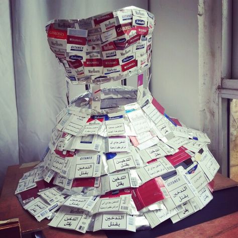 High school art project: Limitation/recycling theme. A dress made of recycled cigarettes boxes . 100% lebanese  :) High School Art Projects, Recycled Dress, Milk Box, Recycle Box, High School Art, School Art Projects, Dress Out, Art Dress, School Art