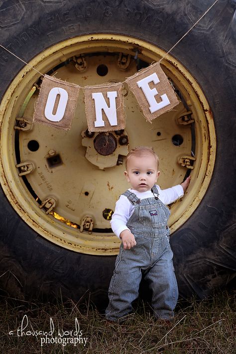 1st Birthday Rodeo Photoshoot, 1st Birthday Tractor Pictures, Tractor Cake Smash, Red Tractor First Birthday Party, Farm First Birthday Photo Shoot, 1st Birthday Farm Pictures Photo Ideas, Farm 1st Birthday Photoshoot, Tractor One Year Birthday, 1st Birthday Boy Tractor Theme