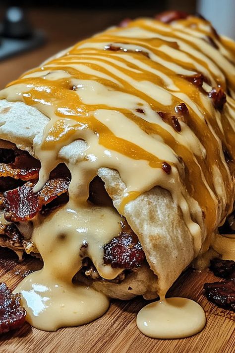 Bacon Cheeseburger Burrito with creamy cheese, crispy bacon, and all your favorite burger toppings in a wrap! Try it tonight! Bacon Cheeseburger Burrito, Unique Bacon Recipes, Cheeseburger Burrito, Bacon Wrapped Cheeseburger, Bacon Cheeseburger Pizza, Burger Recipes Beef, Creamy Cheese Sauce, Cannibis Recipes, Cream Cheese Sauce