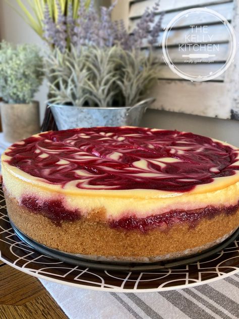 Raspberry Swirl Cheesecake - The Kelly Kitchen Rasberry Cheesecake, Raspberry Puree, Raspberry Swirl Cheesecake, Swirl Cheesecake, Cheesecake Recipes Classic, Raspberry Cheesecake, Sweets Treats, Cheesecake Recipes, Healthy Desserts