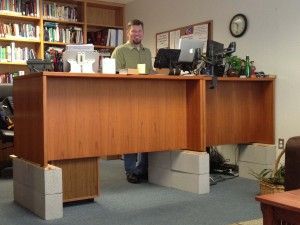 DIY Standing desk Cinder Block Wooden Standing Desk, Lifestyle Improvement, Raising Desk, Diy Standing Desk, Wobble Board, Board Drawing, Tall Chairs, Desk Plans, Stand Up Desk