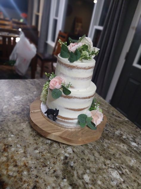 Made my first official wedding cake!  It was an 8" three layer and a 6" three layer yellow cake with buttercream frosting.  Flowers are silk. Wedding Cake Crumb Coat, Crumb Coat Cake With Flowers, Crumb Coat Cake, Crumb Coat Wedding Cake, Frosting Flowers, 15th Birthday Cakes, Boho Birthday Party, Boho Birthday, Yellow Cake