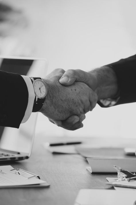 Grayscale Photo of Person's Shake Hands Grant Application, Grant Writing, Proposal Writing, Jackets Men Fashion, Leather Jacket Men, Law Firm, Financial Planning, Teamwork, Personal Branding