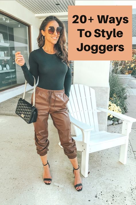 Styling joggers can be done in so many ways. Have you ever wondered how to wear joggers to work? Or how to dress up joggers for date night? In this post you'll find easy to recreate joggers outfit ideas, casual joggers outfits, date night joggers outits, joggers outfits for work, and more! #howtowearjoggers #howtowearjoggerswomensoutfit #howtowearjoggerswomen #howtowearjoggerswinter z3howtowearjoggerswomenchic How To Style A Jogger Pants, Wearing Joggers To Work, Womens Joggers Outfit Dressy Work, Joggers At Work Outfit, Fall Joggers Outfit Dressy, Classy Joggers Outfit, Jogger Pant Outfits Women, Formal Joggers Outfit, Tan Shirt Black Pants Outfit