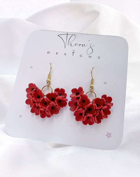 Drop Length: 1.5 in. Colours: Red Background: Red Earring Hardware: Polymer Clay, Gold Plated Rings, Gold Plated. Each pair of our earrings is based on nature and intricately designed to inspire. Each pair is hand-sculpted from premium clay and designed to pair with any outfit. If you are into pretty things, these earrings are calling your name! ITEM CARE: Please note that these are not designed to be water-exposed for long periods. Please keep away from oils, lotions and perfumes. *Keep in mind that all computer monitors display colours differently, so your earring may differ slightly from the image you see onscreen. Pretty Polymer Clay Earrings, Polymer Clay Earrings Valentines, Valentine’s Day Polymer Clay Earrings, Valentines Clay Ideas, Red Polymer Clay Earrings, Floral Polymer Clay Earrings, Valentines Clay Earrings, Valentine Jewelry Ideas, Polymer Clay Valentines Day