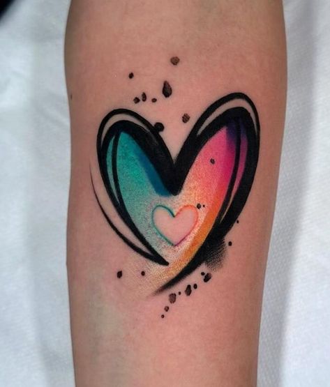 Watercolor Heart Tattoos For Women, Trash Polka Heart Tattoo, Love Inspired Tattoos, Rainbow Tattoo Ideas Unique, Cute Colorful Tattoos, Glitter Tattoo Ideas, Bright Colorful Tattoos, Watercolor Heart Tattoos, Mandala Hand Tattoos