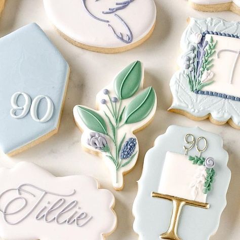 Kim - Ella’s Cookie Jar on Instagram: "“Great shades of blue, you find them in nature, they’re all magic” - Bryan Batt I’ve said it before and I’ll say it again, blue is my favourite 💙 Design inspired by @ruby.lou.company #bluecookies #birthdaycookies #90thbirthday #90thbirthdaycookies #birthdayfavors #birthdaytreats #birthdaycelebration #winnipeg #winnipegcookies #ywgcookies #winnipegsugarcookies #winnipeghandmade #decoratedcookies #royalicing #cookieartist #cookiesofinstagram #ellascookiej Cookie Themes, Decor Cookies, 89th Birthday, 100th Birthday Party, Cookies Theme, Blue Cookies, 90's Birthday Party, Iced Sugar Cookies, Themed Cookies