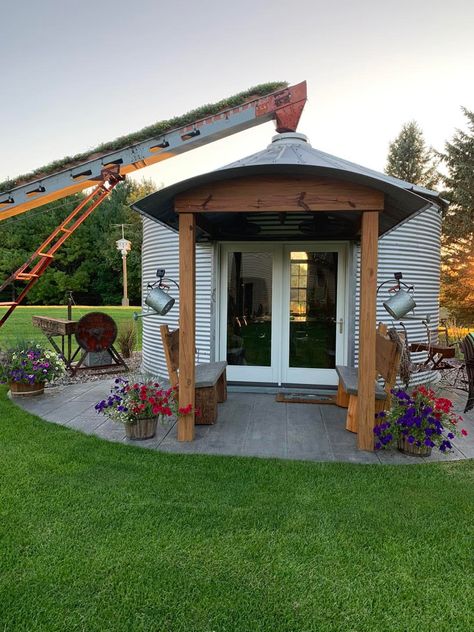 Grain Bin Country Flower Garden Grain Bin Hot Tub Gazebo, Small Silo Ideas, Farm Gazebo, Country Flower Garden, Silo Homes, Farm Silo, Bnb Ideas, Grain Bin House, Grain Bins