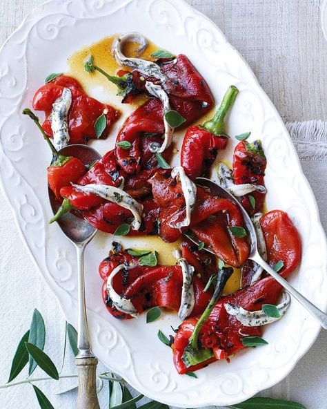 Peppers with roasted garlic, anchovies and basil | delicious. magazine Italian Tapas, Italian Starters, Tapas Menu, Delicious Magazine, Fresh Oregano, Roasted Peppers, Anchovies, Starters Recipes, Roasted Red Peppers