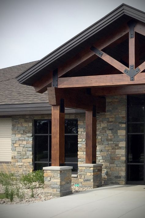 Exterior Wood Beams Entrance, Stack Stone Exterior House Front Porches, Replacing Columns With Wood Beams, Cedar Beams Exterior, Wood Beams Exterior House, Wood Features On House Exterior, Porch Beam Ideas, Gable Roof Over Front Door, Vertical Siding With Stone