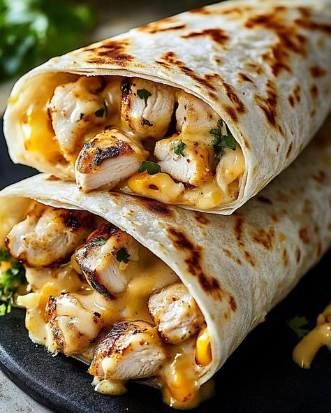 Cheesy Garlic Chicken Wraps - recipeamelia.com Grilled Chicken Ranch Wraps, Cheesy Garlic Chicken Wraps, Chicken Wraps Recipes, Chicken Ranch Wraps, Cheesy Garlic Chicken, Grilled Chicken Wraps, Chicken Wrap Recipes, Chicken Wrap, Pinwheel Recipes