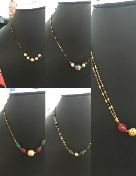 22 carat gold light weight short black beads mangalsutra chains adorned with ruby beads, emerald beads and south sea pearls. Coral Mangalsutra, Short Black Beads, Mangalsutra Chain, Black Beads Mangalsutra, Black Beads Mangalsutra Design, Gold Mangalsutra Designs, Gold Chain Design, Long Pearl Necklaces, Black Beaded Jewelry