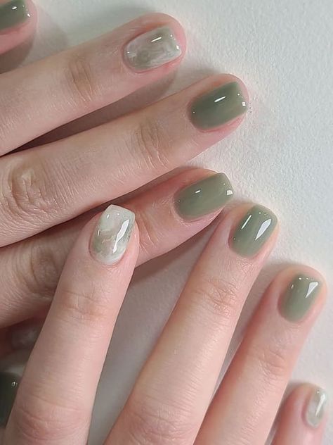 muted olive green short jelly nails with marble effect Nail Green Pastel, Pastel Green Nails Short, Pastel Green Nails Design, Pastel Green Nail Art, Green Pastel Nails, Soft Green Nails, Korean Nails Short, Extra Short Nails, Korean Jelly Nails